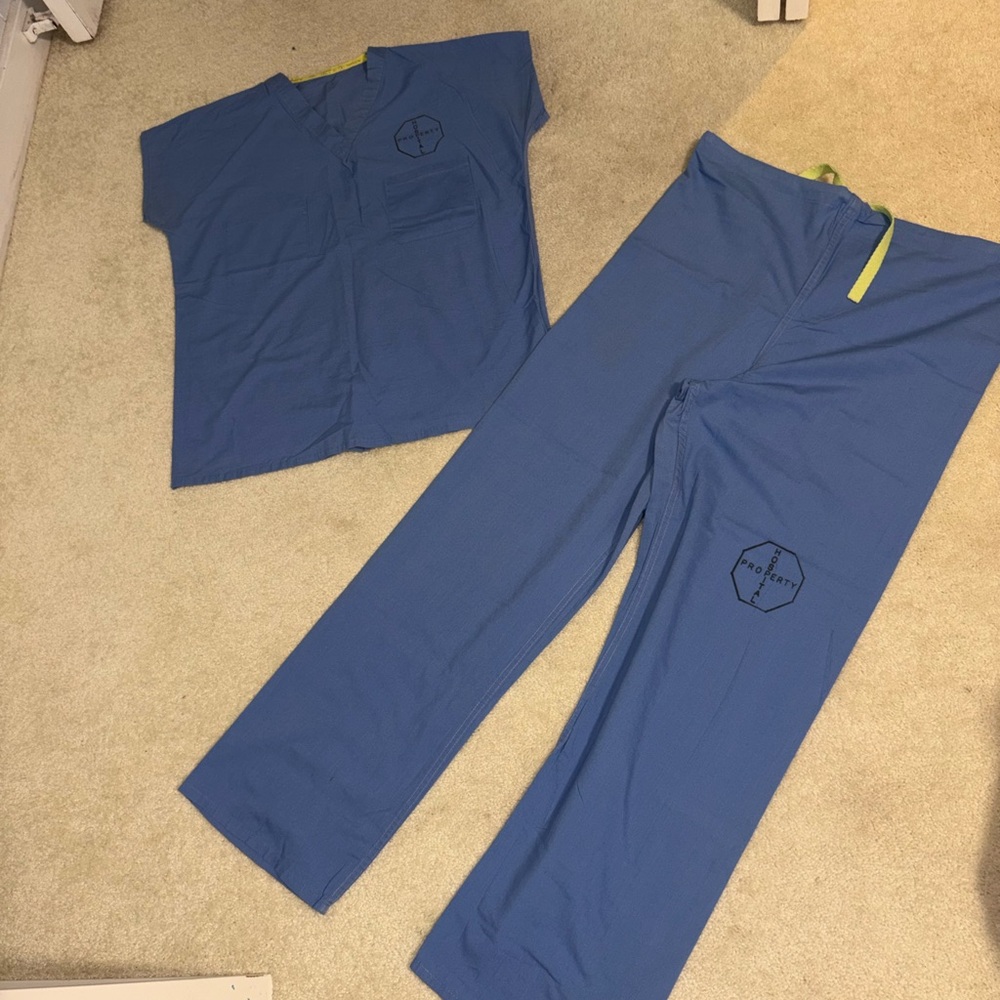 Blue nurse/docto’s scrubs. Size S, has “Hospital Property” written on